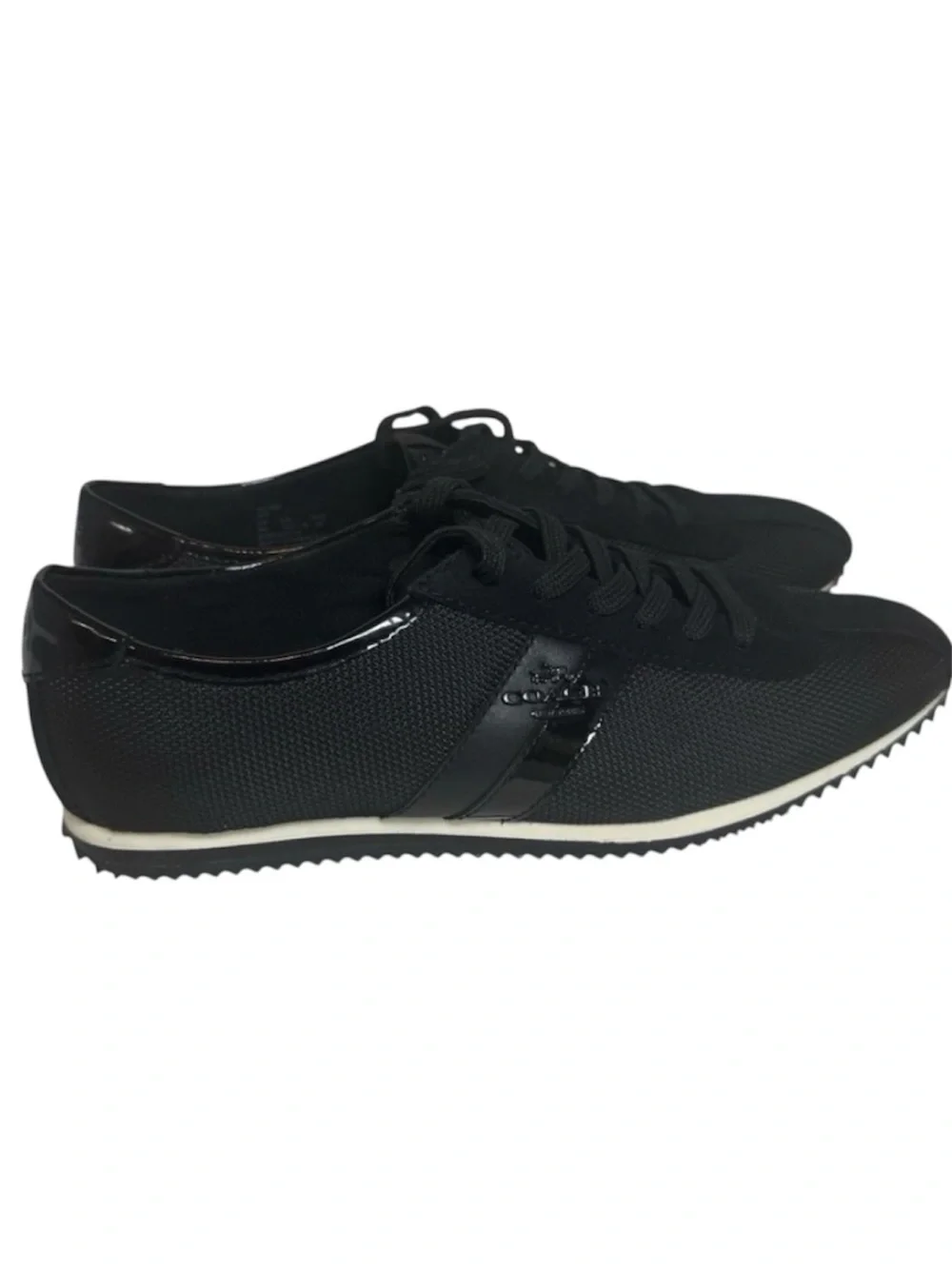 Coach sleek black